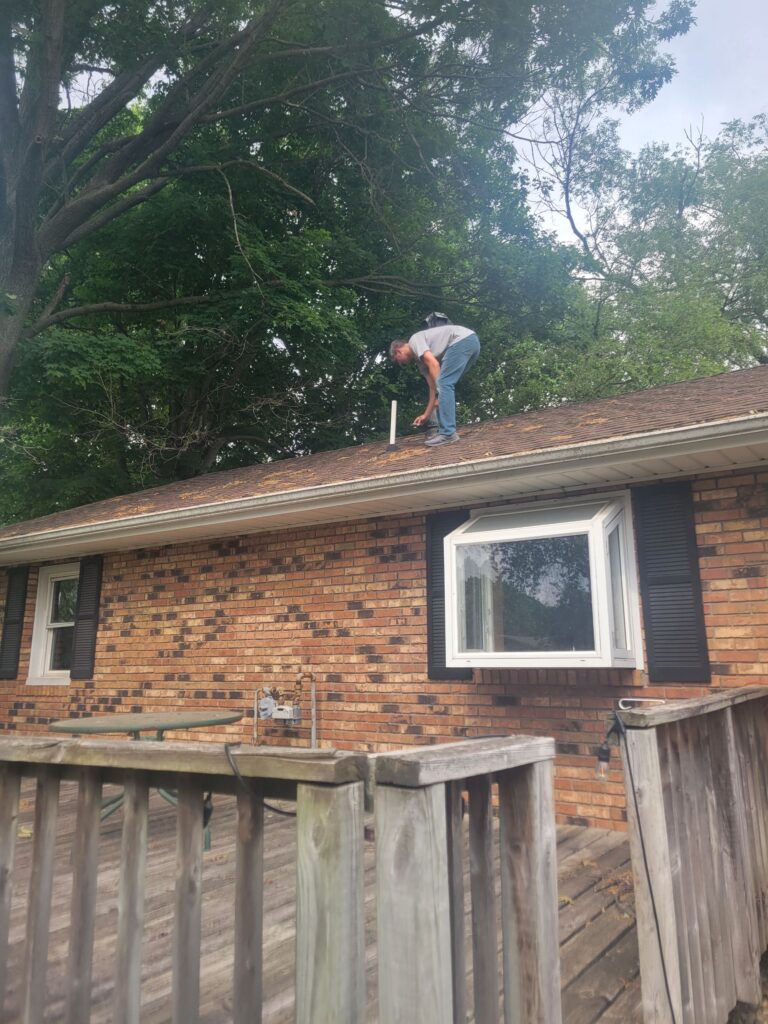 JD Taggart performs roof inspection